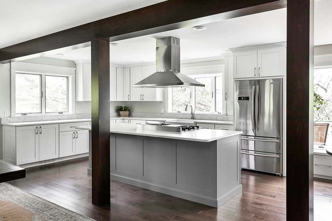 Pure White Kitchen Design with Custom Cabinetry in Fairfield, Iowa