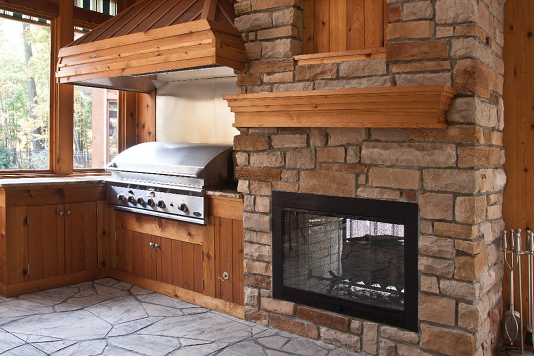 Outdoor Space with a Kitchen and Fireplace Available at JC Huffman in Fairfield, Iowa