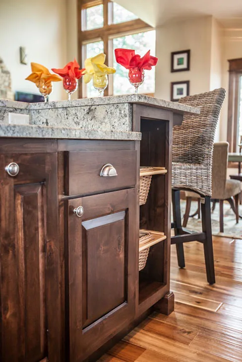 Add contrast to your rustic alder wood cabinets with a dark stain.