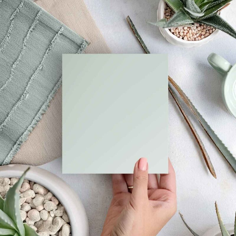 An aloe green cabinet sample in a mood board.