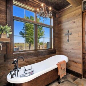 Reclaimed barnwood used on a bathroom wall.