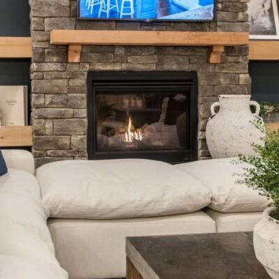 Stone veneer on indoor fireplace.
