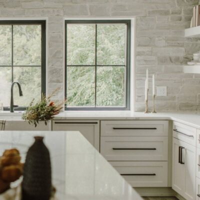 Light gray stone veneers on a kitchen wall.