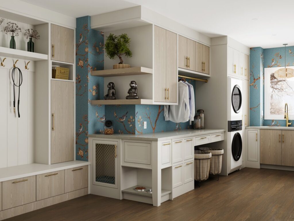 Pet friendly laundry room remodel with custom cabinetry, built in feeding station, hanging storage, hampers, and washer and dryer area.