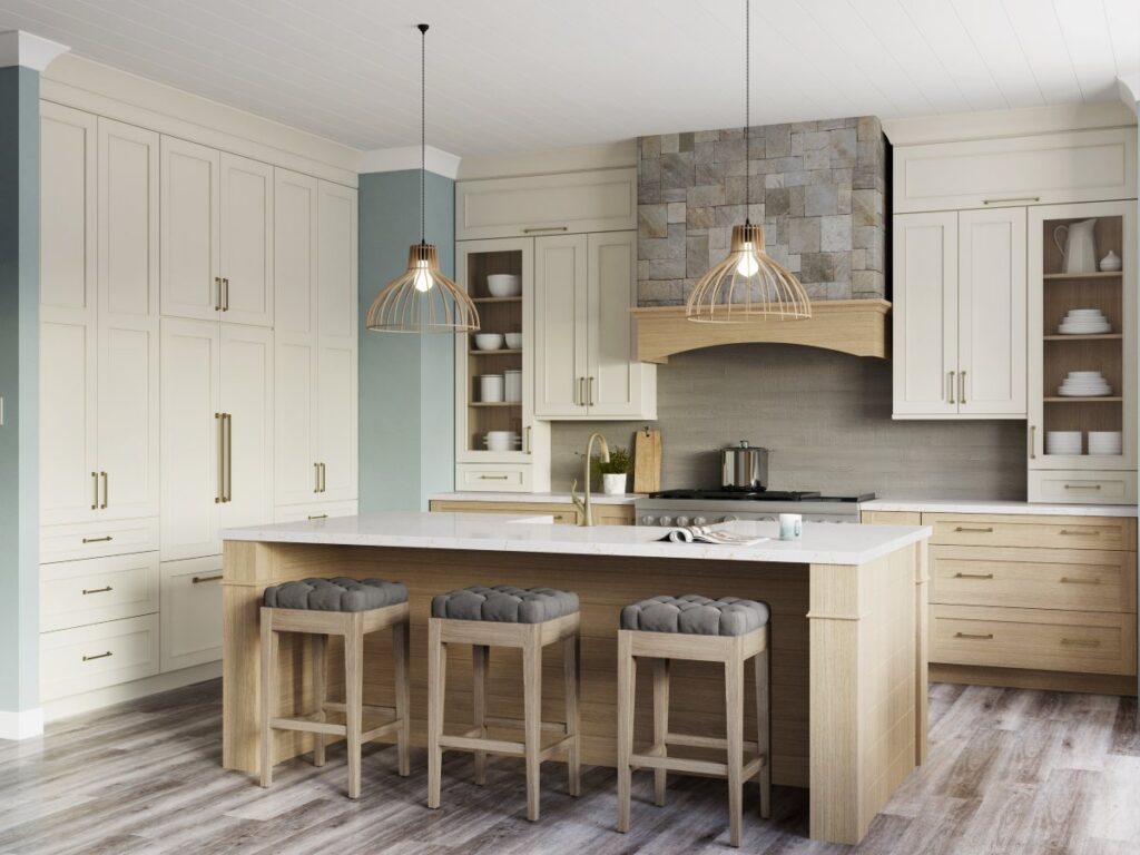 A stunning Burlington kitchen remodel utilizing kitchen cabinets antique white to create a warm, lived-in character, perfectly paired with a durable Cambria Quartz island.